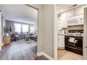 Open-concept living space seamlessly connects the living room and kitchen area at 215 Piedmont Ne Ave # 904, Atlanta, GA 30308