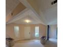 Bright living room with large windows and interesting architectural ceiling design elements at 3348 Concord Se Cor, Conyers, GA 30013