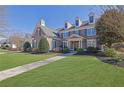 Lovely home with a well-kept lawn and inviting walkway leading to the entrance at 3740 Williams Point Dr, Cumming, GA 30028