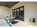 Outdoor patio with comfortable seating, a ceiling fan, and sliding glass doors at 1110 Briar Cove Cir, Atlanta, GA 30329
