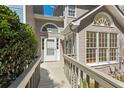 Inviting entrance with beautiful windows and a well-maintained walkway at 1661 Paddlewheel Dr, Marietta, GA 30062
