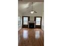 Bright living room boasts a fireplace and vaulted ceilings at 2520 Laurel Nw Cir, Atlanta, GA 30311