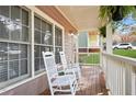 Relax on the charming front porch with rocking chairs at 109 Bowen Sw Cir, Atlanta, GA 30315