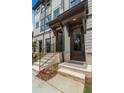 Inviting townhome entrances featuring brick stairs, elegant railings, and well-maintained landscaping at 1283 Forsyth Park Rd, Decatur, GA 30033