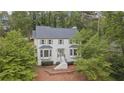 Charming two-story home with a landscaped yard and a welcoming front entrance at 1945 Wenlok Ne Trl, Marietta, GA 30066