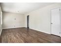 Spacious living room featuring wood-look flooring and neutral paint colors, ready for personalization at 2564 Brentwood Rd, Decatur, GA 30032