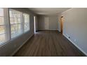 Bright living room with large windows, new floors, and fresh paint at 2703 Rainbow Forest Dr, Decatur, GA 30034
