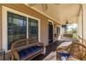 A relaxing covered front porch featuring comfortable seating and a tranquil view at 2628 White Oak Dr, Decatur, GA 30032