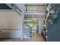 Bright foyer with hardwood floors, staircase, soaring ceilings, and an upper level landing at 320 N Drew Ct, Duluth, GA 30097