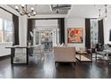Open living room with a dining area and balcony access, offering a seamless indoor-outdoor living experience at 206 11Th Ne St # 205, Atlanta, GA 30309