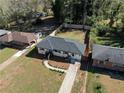 Aerial view of property, showcasing the manicured lawn and neighboring homes, offering a neighborhood view at 1882 Rosewood Rd, Decatur, GA 30032