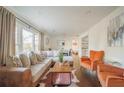 Comfortable living room showcasing hardwood floors, natural light, and stylish furnishings at 1893 Windsor Sw Dr, Atlanta, GA 30311