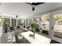 Bright sunroom with large windows, comfortable seating, and access to the backyard at 3524 Brookfield Ln, Decatur, GA 30032
