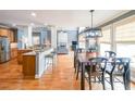 Open floor plan showcasing the dining area connected to the gourmet kitchen at 103 Gold Springs Ct, Canton, GA 30114