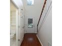 Bright entryway with high ceiling, wood floors, and staircase access at 2158 Berryhill Se Cir, Smyrna, GA 30082