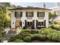 Charming home featuring lush landscaping and a cozy patio, ideal for outdoor enjoyment at 31 Lafayette Ne Dr, Atlanta, GA 30309