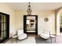 Covered patio featuring comfortable seating and seamless indoor-outdoor living at 31 Lafayette Ne Dr, Atlanta, GA 30309