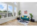Bright living room featuring large windows, stylish decor, and modern finishes and beautiful outside view at 747 Ralph Mcgill Ne Blvd # 337, Atlanta, GA 30312