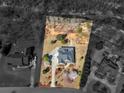 An aerial shot highlighting the home's layout, landscaped yard, mature trees, and surrounding neighborhood at 612 Kristen Ct, Mcdonough, GA 30252