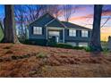 Charming two-story home with two-car garage and mature trees at 2593 Abbotts Glen Nw Dr, Acworth, GA 30101