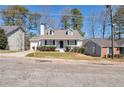 Comfortable home with a manicured front yard, side garage, and convenient street access at 5551 Panola Pl, Lithonia, GA 30058