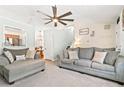 Comfortable living room with neutral tones, plush seating, and abundant natural light at 38 Wayfaring Ct, Rockmart, GA 30153