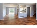 Bright and spacious living area connecting to a modern kitchen and outdoor access at 2666 Frontier Trl, Atlanta, GA 30341