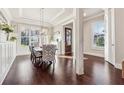 Bright dining area with hardwood floors, stylish chairs, and large windows for natural light at 3363 Stetson Overlook Se, Smyrna, GA 30080