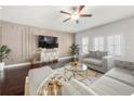 Bright living room boasts hardwood floors, contemporary furnishings, and elegant wall accents at 82 Rising Fawn Ln, Marietta, GA 30060