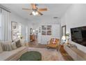 Comfortable living room with built in shelves, hardwood floors, and cozy furniture at 91 Griggs Sw St, Marietta, GA 30064