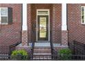 Brick front entrance featuring a black door, rail, and classic address numbers at 2736 Bell Se Dr, Smyrna, GA 30080