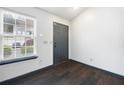 View of front door and beautiful flooring inside the home at 115 Oak Grove Pl, Acworth, GA 30102