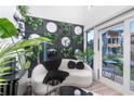 Stylish living room with modern decor, comfortable seating, and a view of the outdoors at 3120 Godby Rd # 1118, Atlanta, GA 30349