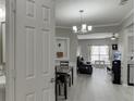 View of open-concept living space with dining area and contemporary decor at 3826 Dandridge Way, Duluth, GA 30096
