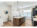 Stylish kitchen featuring a large island, stainless steel appliances, and ample counter space at 4460 Dalston Ne Dr, Atlanta, GA 30342