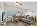 Comfortable living room with a plush sectional sofa and a view of the dining area at 1901 Creel Ln, Atlanta, GA 30349