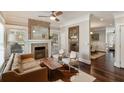 Inviting living room featuring a fireplace with stone surround and hardwood floors at 2091 Mclendon Ne Ave, Atlanta, GA 30307