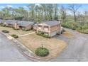 A charming exterior view of the brick home situated on a well maintained lot at 3347 Stonecrest Ct, Atlanta, GA 30341