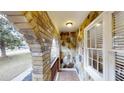 Inviting front porch with stone and brick features, providing a cozy welcome at 3868 Prentiss Dr, Decatur, GA 30034