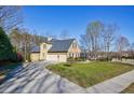 Inviting home with a two-car garage and spacious driveway at 2667 White Rock Dr, Buford, GA 30519