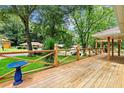View of the spacious wood deck, perfect for outdoor entertaining and relaxation at 215 Collum Nw St, Atlanta, GA 30314