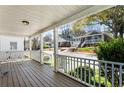 Covered front porch with a view of neighboring homes at 900 Oakhill Sw Ave, Atlanta, GA 30310