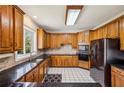 Well-equipped kitchen with stainless steel appliances and granite countertops at 321 Covered Bridge Sw Pl, Smyrna, GA 30082