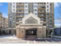 View of the front entrance of the high-rise building featuring the Park Towers logo at 795 Hammond 1013 Dr, Sandy Springs, GA 30328