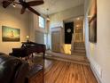 Inviting living area featuring hardwood floors, a ceiling fan, and an abundance of natural light at 2926 Summercrest Ln, Duluth, GA 30096
