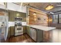 Spacious kitchen with stainless steel appliances and eat-in kitchen island at 3235 Roswell Ne Rd # 421, Atlanta, GA 30305