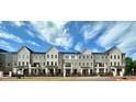 Beautiful townhome exterior featuring multiple stories and modern architectural details at 540 Sawnee Village Blvd # D68, Cumming, GA 30040