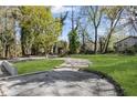 Spacious driveway and front yard provide ample parking and a beautiful approach to the property at 175 Holly Nw Rd, Atlanta, GA 30314