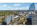 Beautiful aerial view of the cityscape and lush green surroundings on a clear day, showing off the property's location at 3324 Peachtree Ne Rd # 2808, Atlanta, GA 30326