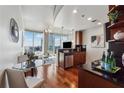 Modern kitchen with sleek countertops, stainless steel appliances, and an open layout overlooking the living space at 3324 Peachtree Ne Rd # 2808, Atlanta, GA 30326